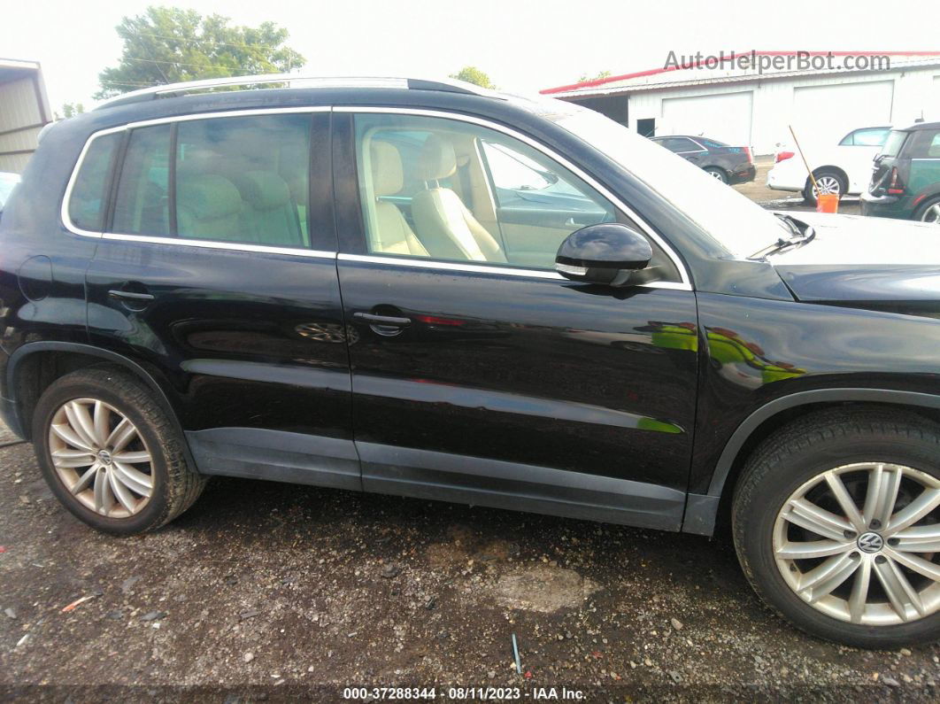 2010 Volkswagen Tiguan Wolfsburg Black vin: WVGAV7AX1AW521233