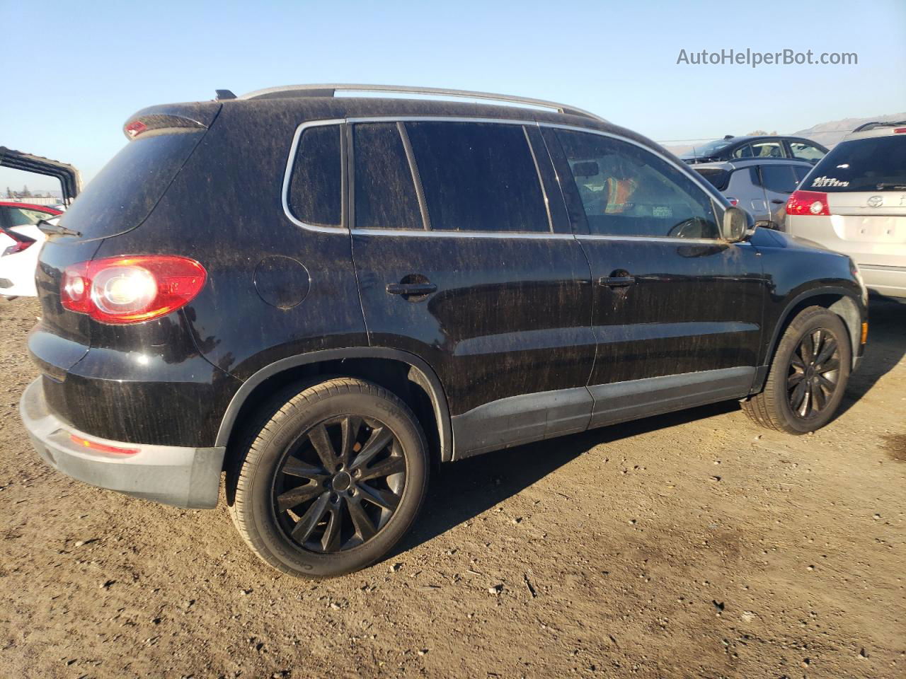 2010 Volkswagen Tiguan S Black vin: WVGAV7AX5AW001455