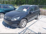 2016 Volkswagen Tiguan S Black vin: WVGAV7AXXGW557141