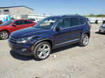 2016 Volkswagen Tiguan S Blue vin: WVGAV7AXXGW614034