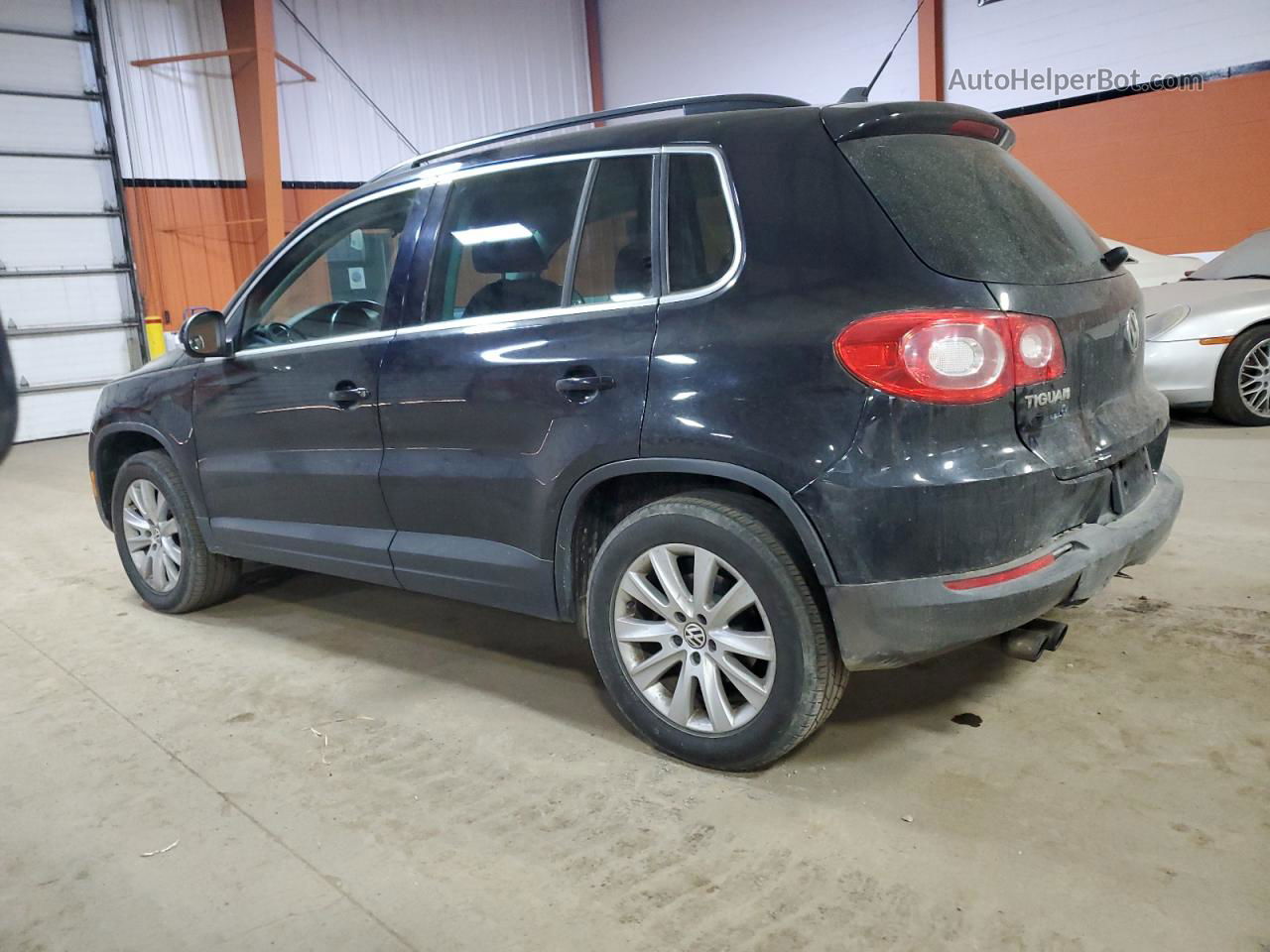 2010 Volkswagen Tiguan Se Black vin: WVGBV7AX1AW001943