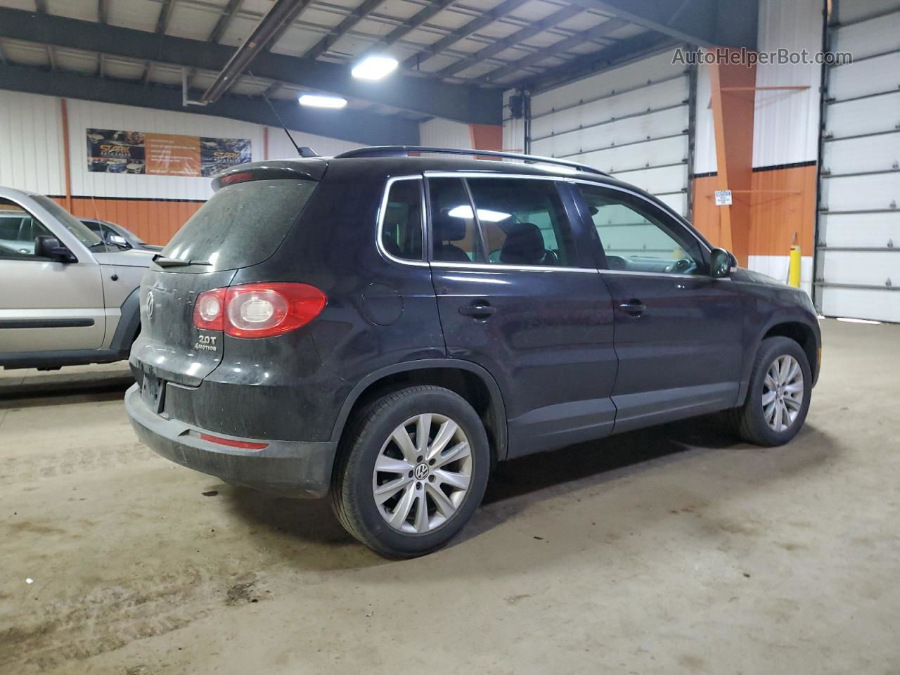 2010 Volkswagen Tiguan Se Black vin: WVGBV7AX1AW001943