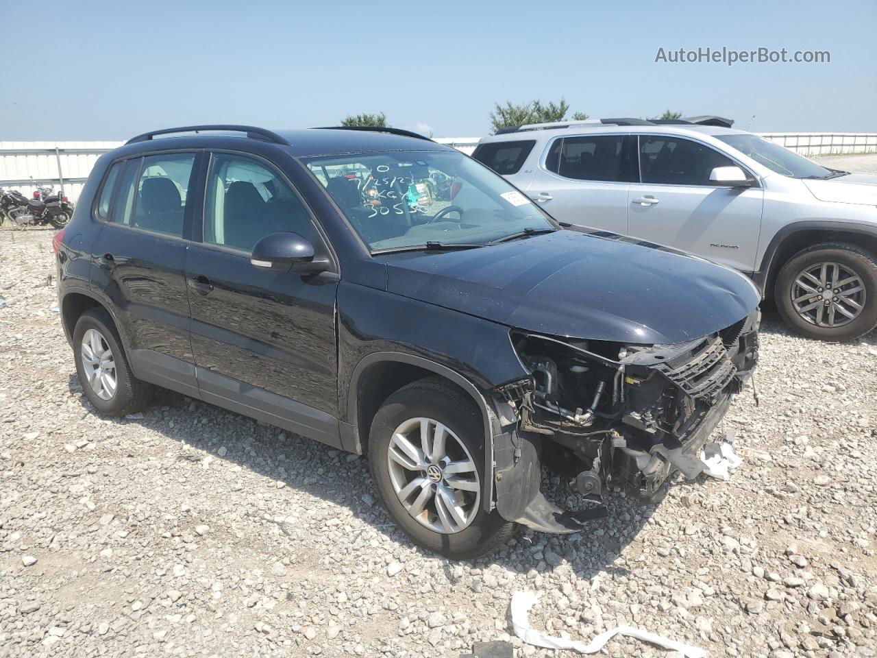 2016 Volkswagen Tiguan S Черный vin: WVGBV7AX1GW014409