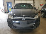 2014 Volkswagen Touareg V6 Черный vin: WVGDF9BP0ED013096