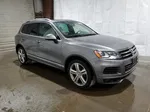 2014 Volkswagen Touareg V6 Серый vin: WVGDF9BP5ED015040