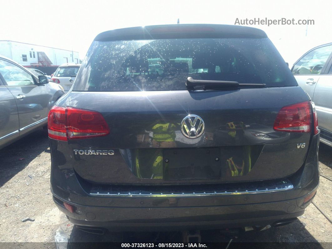 2013 Volkswagen Touareg Exec Серебряный vin: WVGEF9BP1DD002627