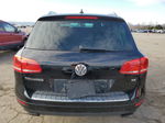 2013 Volkswagen Touareg V6 Черный vin: WVGEF9BP2DD001356