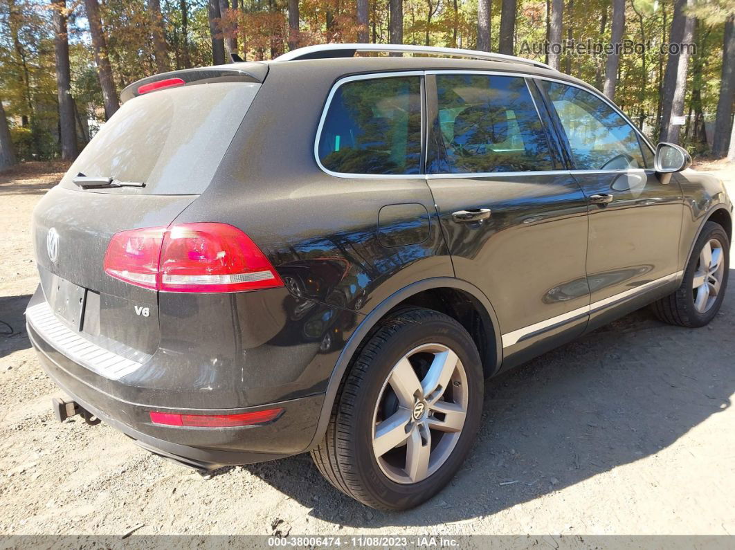 2014 Volkswagen Touareg Lux Черный vin: WVGEF9BP3ED007314