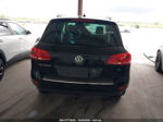 2014 Volkswagen Touareg Sport W/nav Черный vin: WVGEF9BP3ED009208