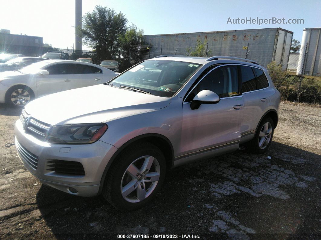 2013 Volkswagen Touareg Lux Серебряный vin: WVGEF9BP4DD002539