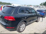 2012 Volkswagen Touareg Sport Черный vin: WVGEF9BP6CD006672