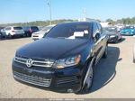 2012 Volkswagen Touareg Lux Черный vin: WVGEF9BP9CD011462