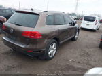 2012 Volkswagen Touareg Tdi Lux Коричневый vin: WVGEK9BP4CD006326