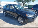 2014 Volkswagen Touareg Lux Черный vin: WVGEP9BP0ED001953