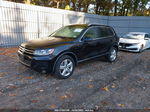 2014 Volkswagen Touareg Lux Black vin: WVGEP9BPXED012894