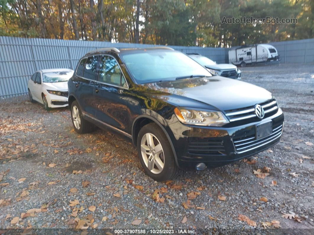 2014 Volkswagen Touareg Lux Black vin: WVGEP9BPXED012894