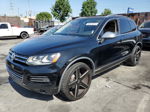 2012 Volkswagen Touareg V6 Черный vin: WVGFF9BP5CD004559