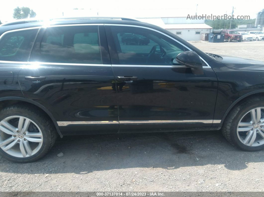 2012 Volkswagen Touareg Exec Black vin: WVGFK9BPXCD000714