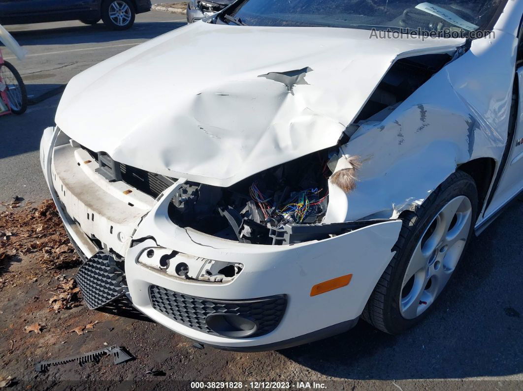 2009 Volkswagen Gti 2-door  M6 Discontinued White vin: WVWEV71K89W000208