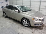 2015 Volvo S60 Premier+ Золотой vin: YV140MFC7F1309634